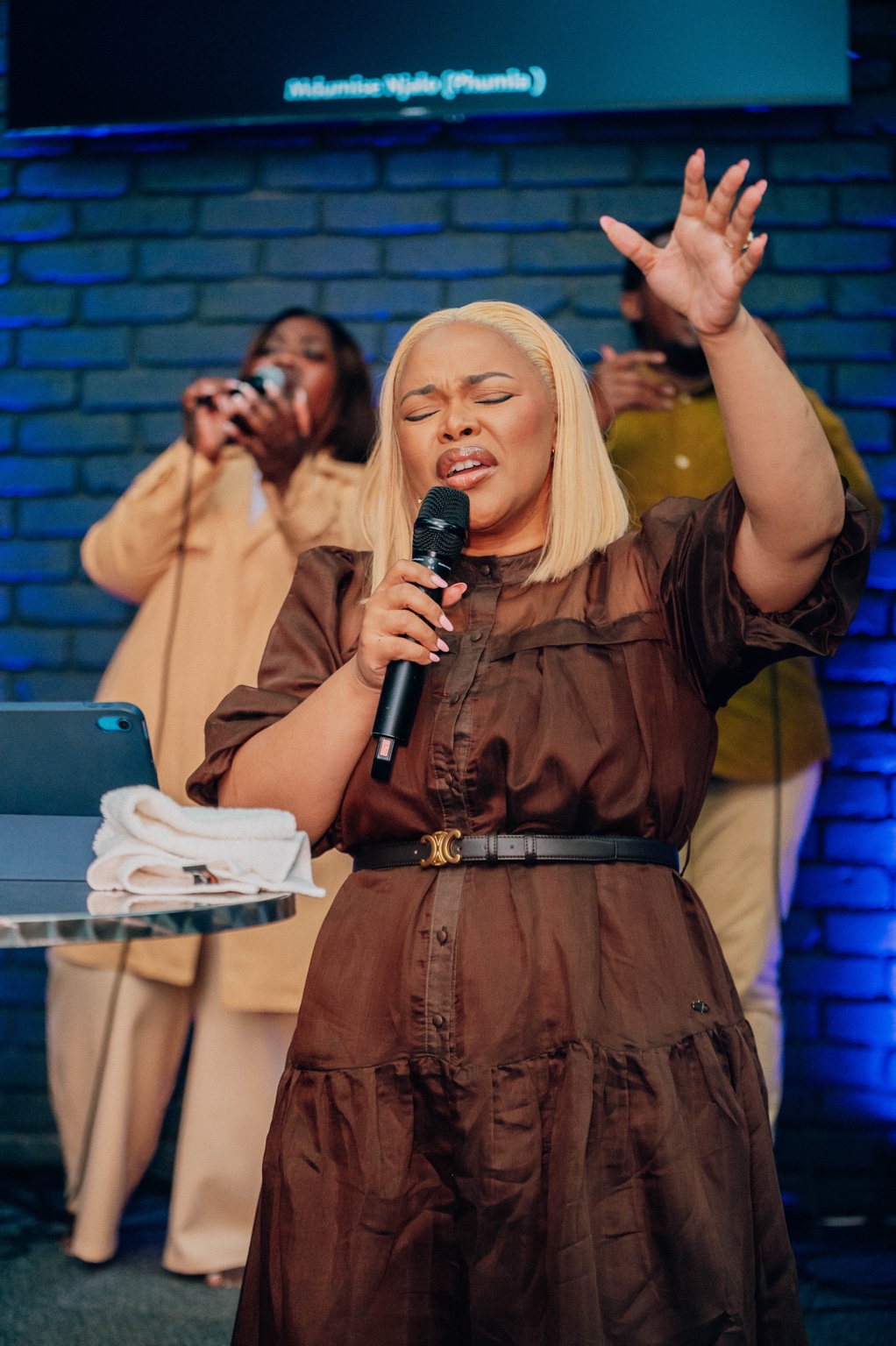 Yolanda Bam-Mguye leading women in worship